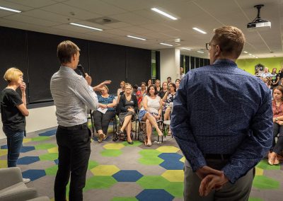 A photo of people together at a local network event